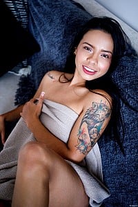 Cute Maddison - Cute Maddison arches on the couch, fully exposing her perky tits